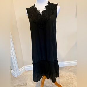 Black sleeveless size medium slip on dress with a lace V-neck by Max Studio